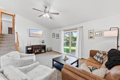 Well lit and inviting living room to gather in.