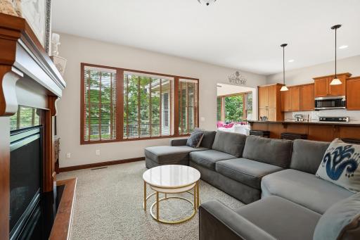 Enjoy the upcoming fall & winter evenings sitting near the rustic fireplace, it adds charm, while large windows let in natural light.