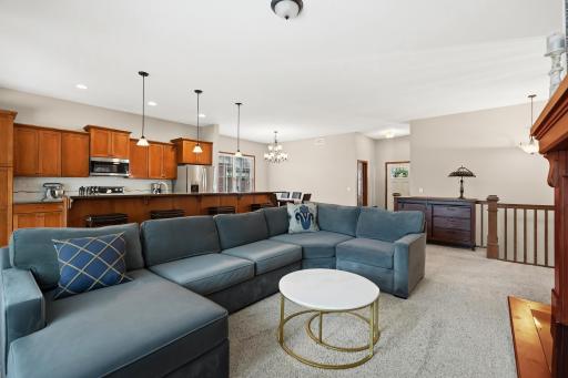 Open & spacious living room area flows into dining & kichen space.