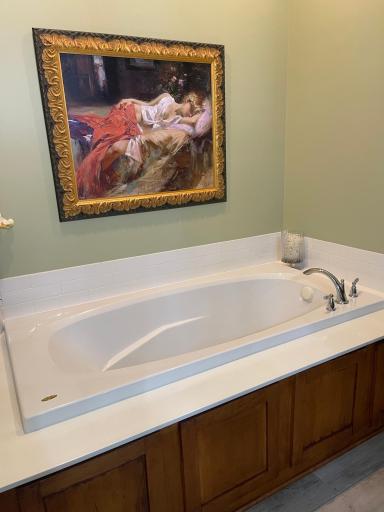 Primary suite offers a large soaking tub!