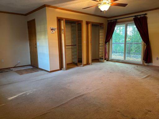 Main level Primary Bedroom with Deck