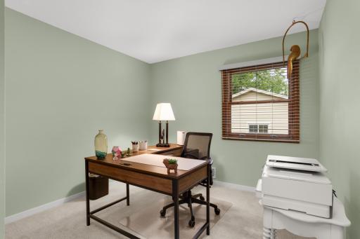 Bedroom 3 â Versatile main-level bedroom, currently used as a home office.