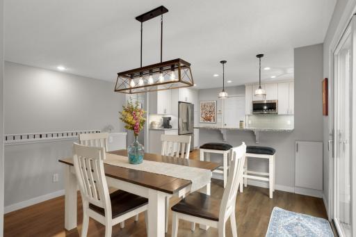 Open dining and kitchen layout creates a connected, functional main-level living space.