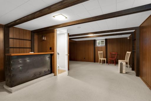 Spacious lower-level family room provides plenty of flexibility for a TV area, game room, or recreation space.