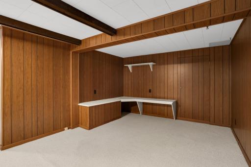 Bonus lower-level space with built-in workspaceâideal for a home office, hobbies, gaming, or additional storage.