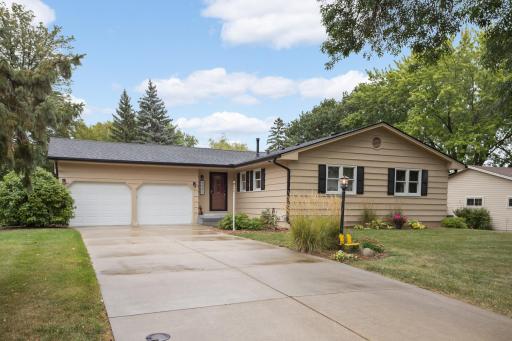 Charming exterior surrounded by mature trees and established landscaping. Don't miss out on this gem!