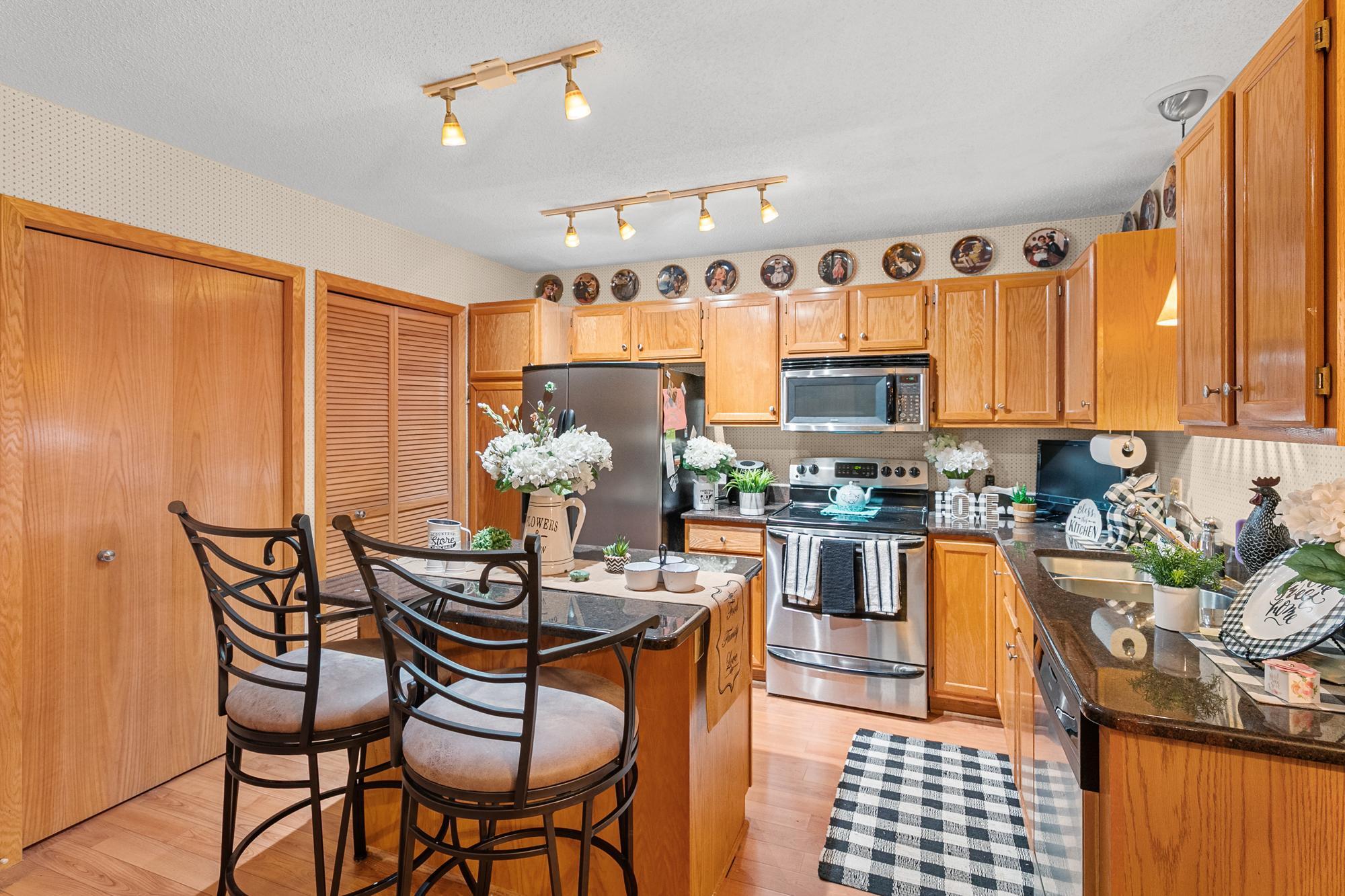 Upgraded kitchen countertops and SS appliances