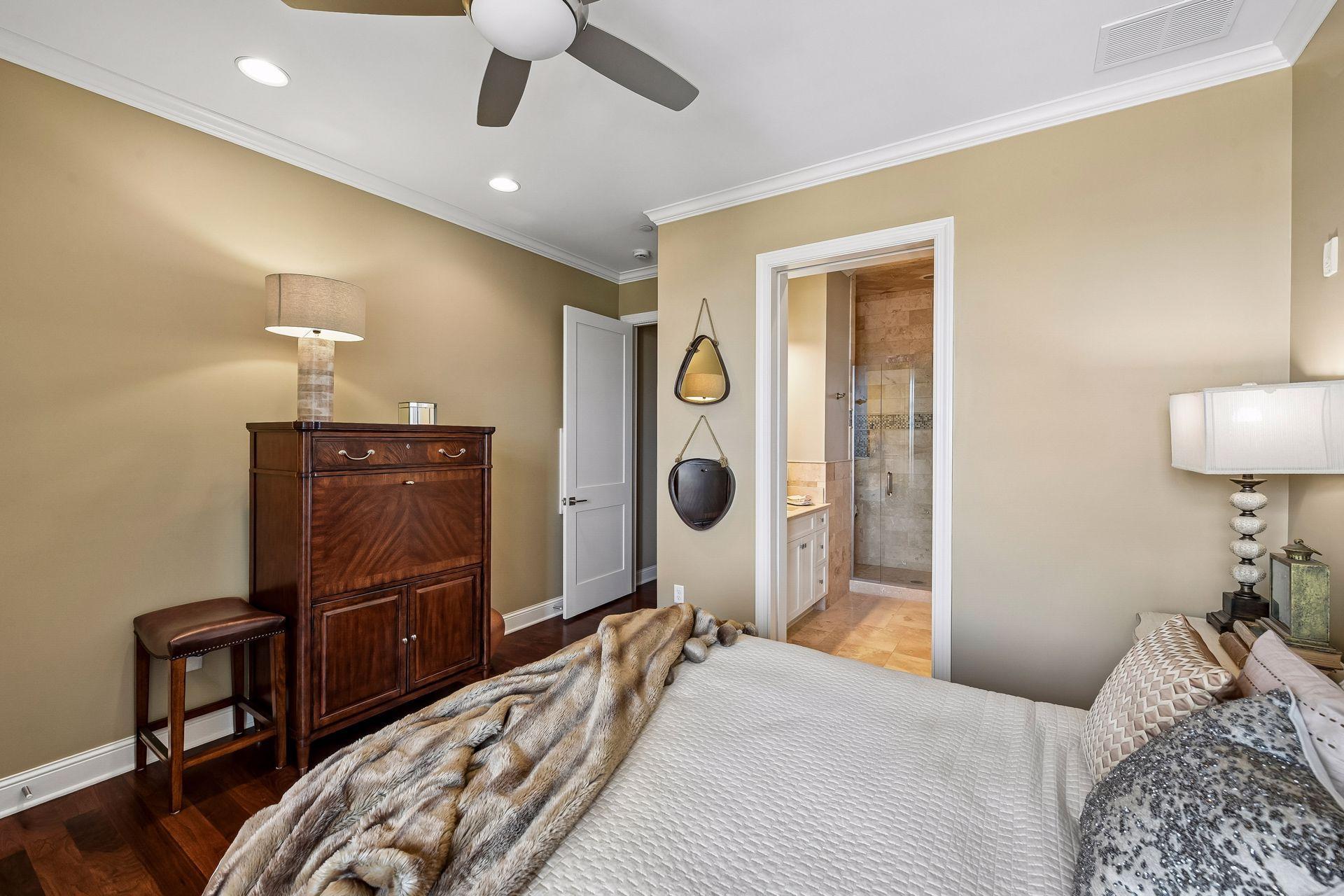 Second bedroom with en-suite 3/4 bathroom with a walk-in shower