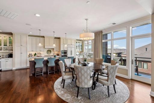 Informal dining space off the kitchen with access to one of the balconies