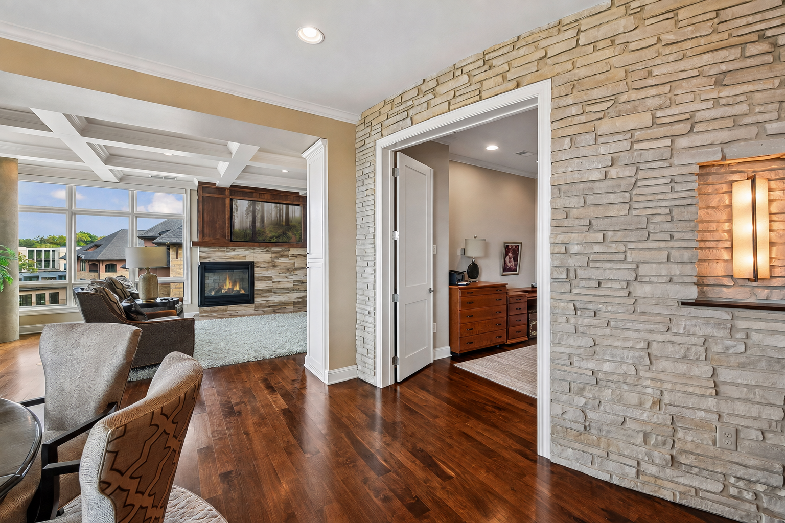 Beautiful floor to ceiling stone wall with access to the office