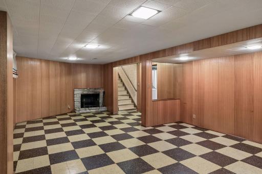 A second wood burning fireplace is located in the lower level