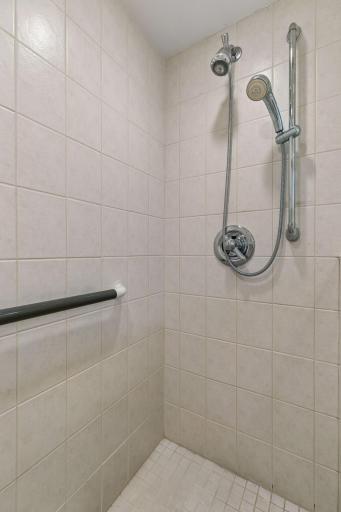 This ¾ bath is appointed with a spacious, fully tiled walk-in shower.
