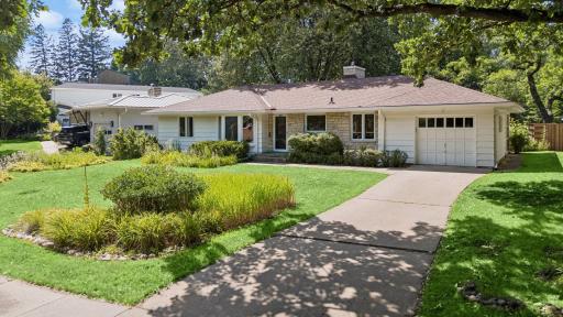 Welcome to 2024 Drew Avenue S, where comfort, character, and an unbeatable location come together.