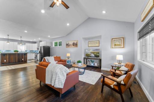 The main level opens with a spacious living room and seamless floor plan.