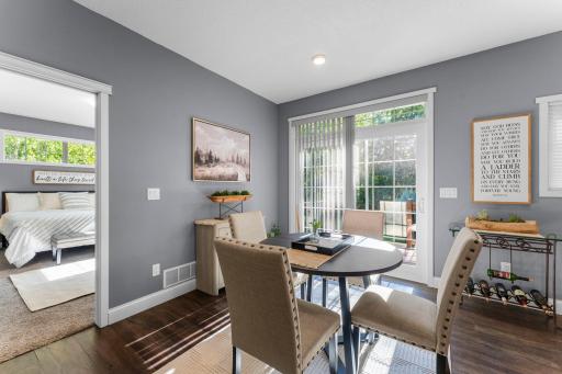 The dining area steps right out to the back deck, so summer dinners can move outside without a second thought.