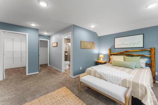 Generous walk-in closet with a private en-suite.