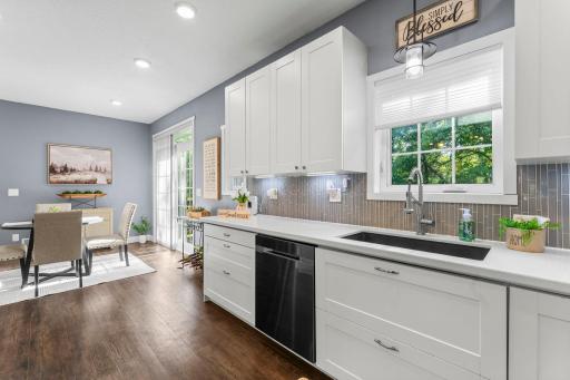 Large kitchen sink with views overlooking the backyard.