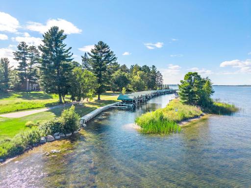 Two dedicated boat slips are included with the property, one covered and one uncovered, located in the harbor maintained and lighted by the HOA.