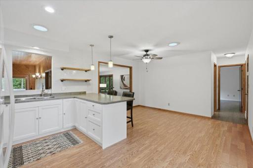 Kitchen open design connects easy flow to the dining area.