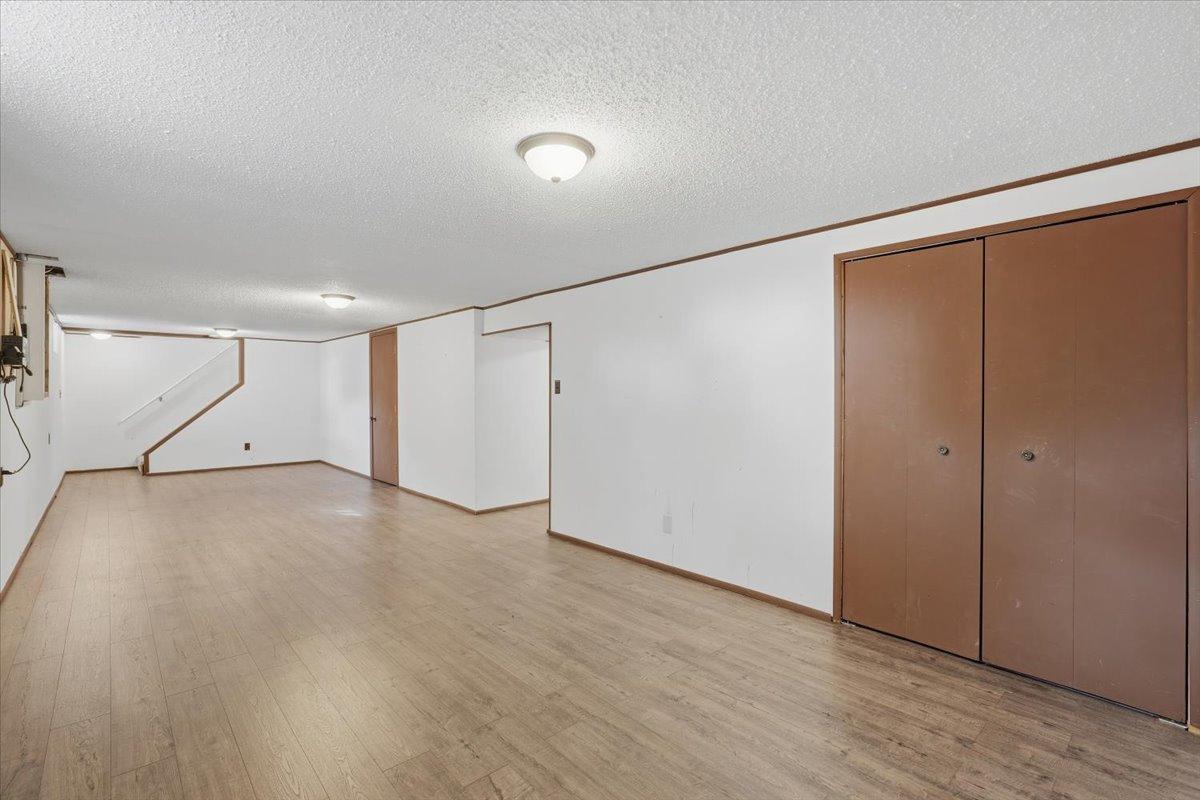 Versatile lower level family room with plenty of room to make it your own.