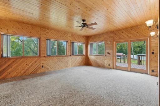 Beautiful sunroom with warm wood accents and plenty of natural light.