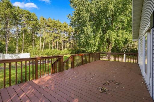Large deck with plenty of space for outdoor dining/grilling, entertaining and relaxing.