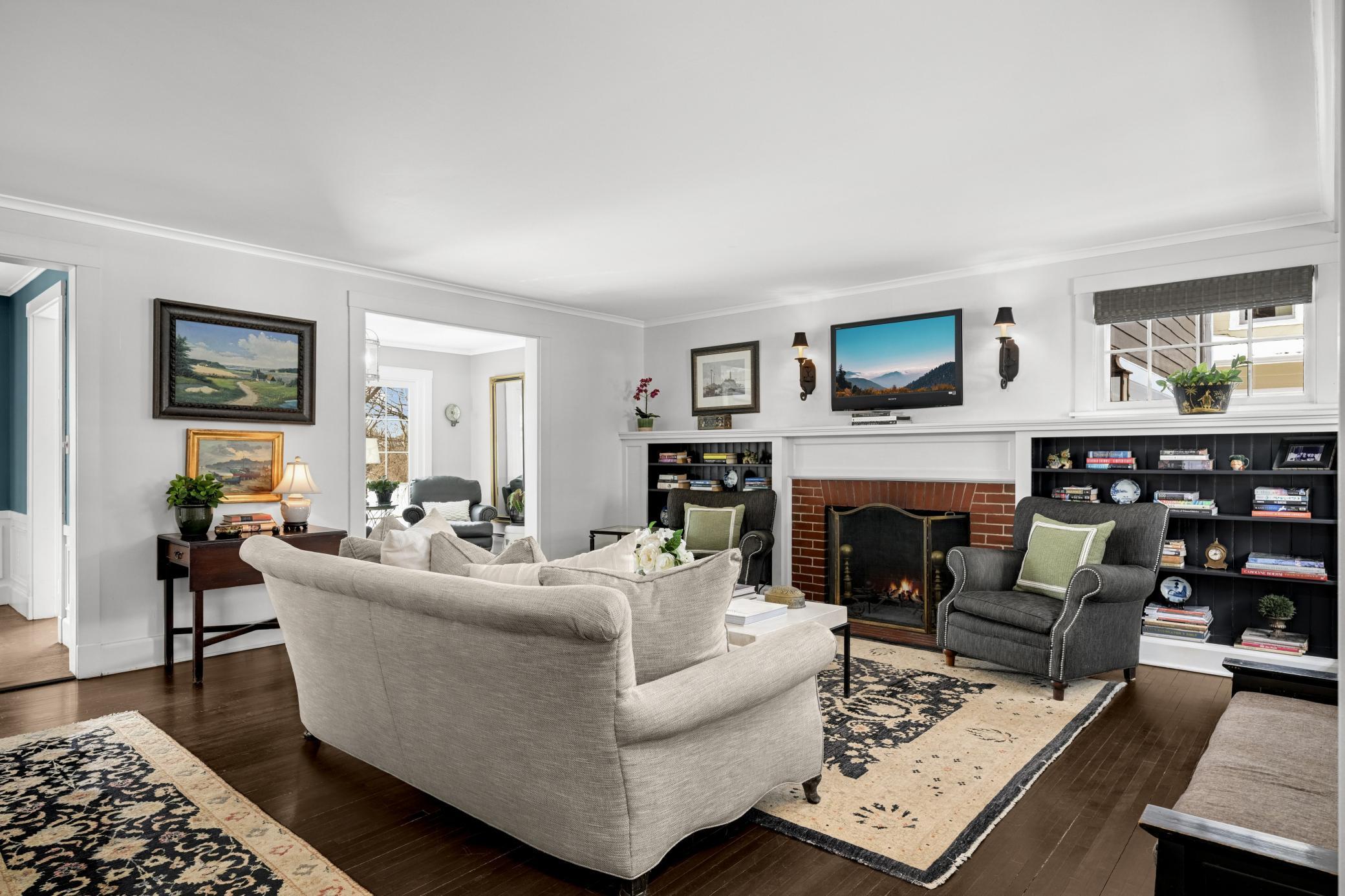 Woodburning Fireplace flanked by boocases