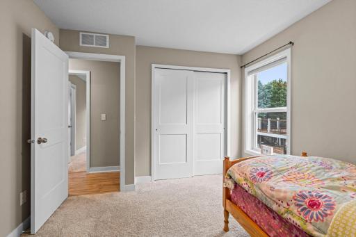The 2nd bedroom on the main level is bright, clean and has lots of closet space. 1515 138th St E, Rosemount, MN