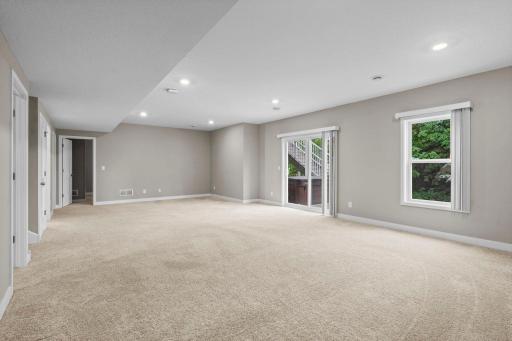 The very large finished lower level has a bedroom, family room, flex room, utility/storage room and walks out to your hot tub. 1515 138th St E, Rosemount, MN