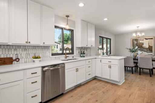 Quartz counter tops and marble tile backsplash!