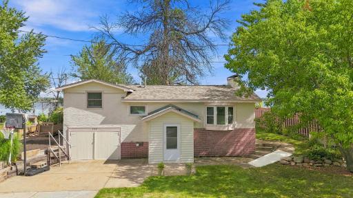 Well maintained stucco and brick exterior