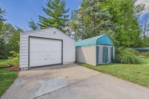 Detached 1 stall garage and storage shed