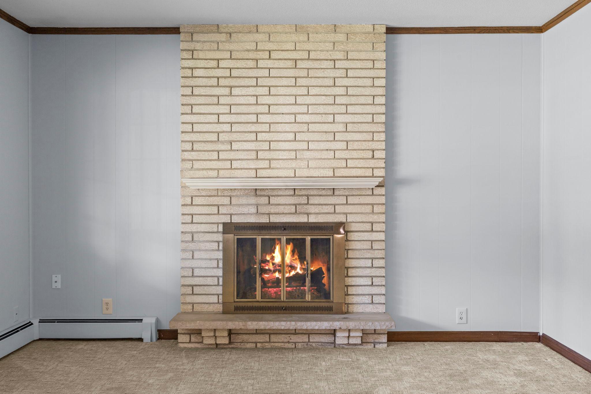 Wood burning fireplace in Family Room