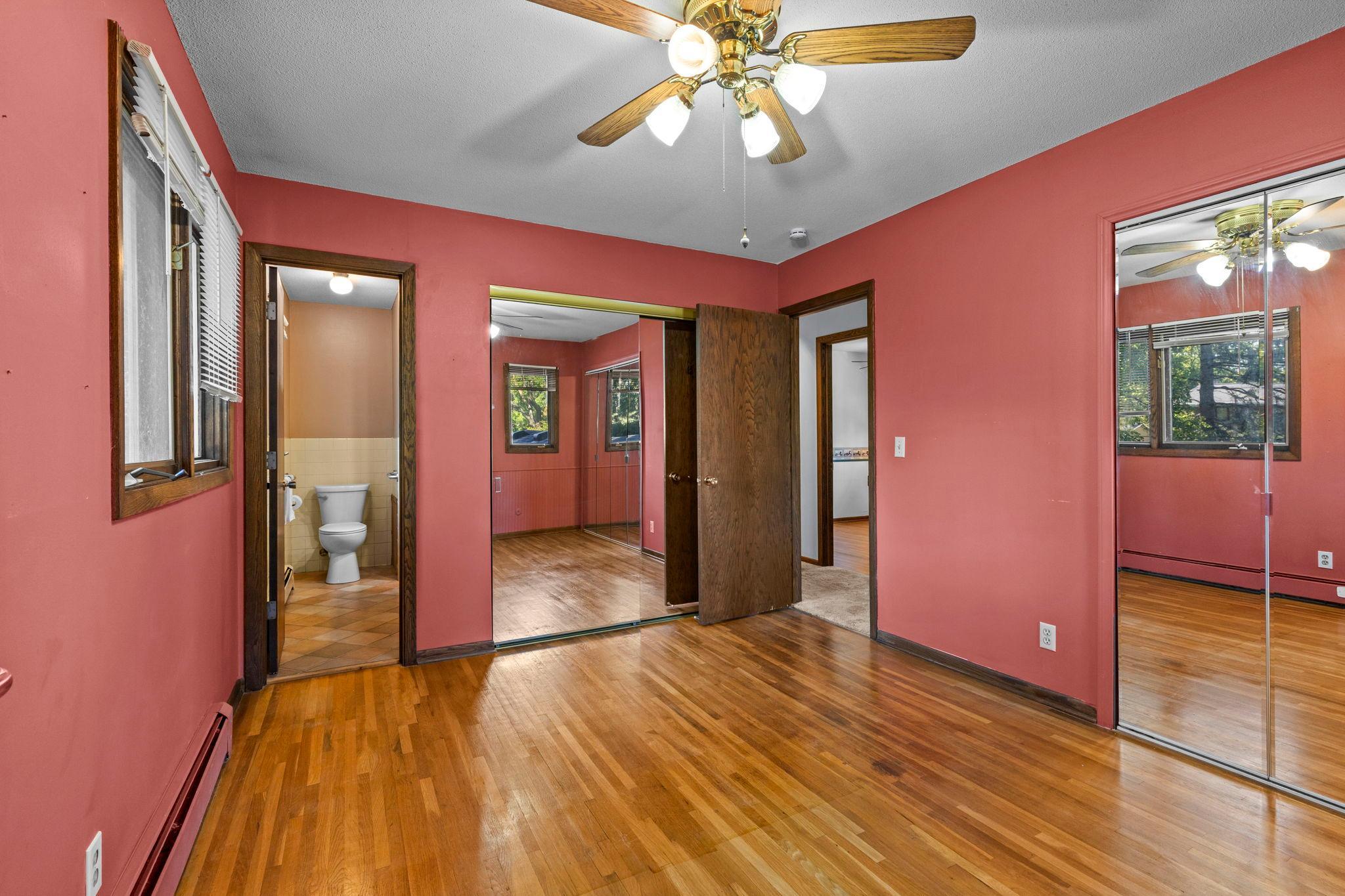 Primary bedroom with access to full bath and 2 large closets