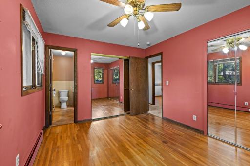 Primary bedroom with access to full bath and 2 large closets
