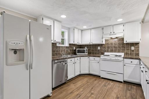 New dishwasher 2024. Kitchen with plenty of counter and cupboard space.
