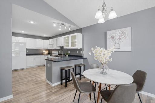 The kitchen, dining area and adjoining living space flow together, giving an open and connected feel.