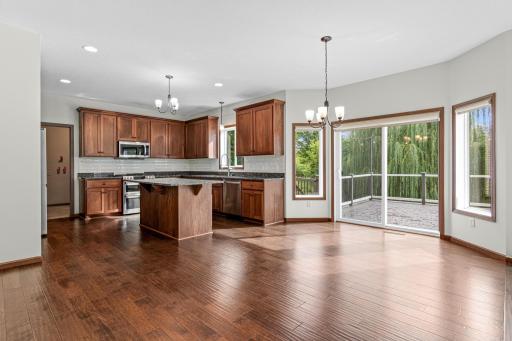 Kitchen/Dining that walks out to the large deck and out to backyard.