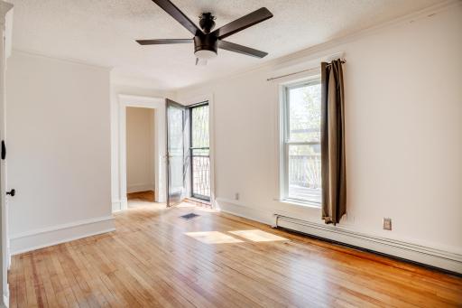 Primary bedroom with large upper level deck.