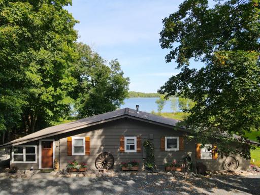 Welcome to 55556 Eggar Rd on Little Sand Lake!