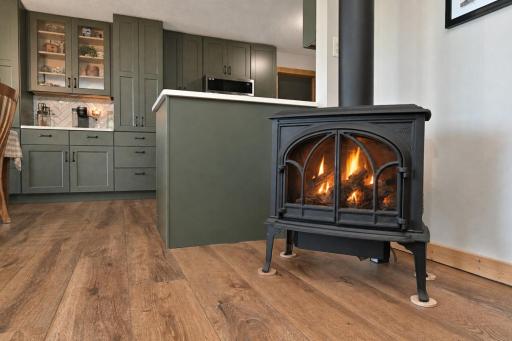 FREE STANDING FIREPLACE WITH FIRE.jpeg