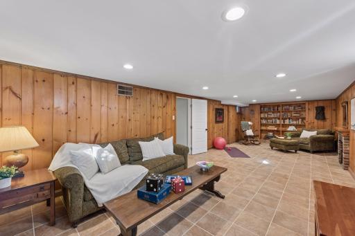 Lower-Level Family Room - This wide-angle view shows just how much space the lower level provides for seating, recreation, games, exercise, or other flexible uses.