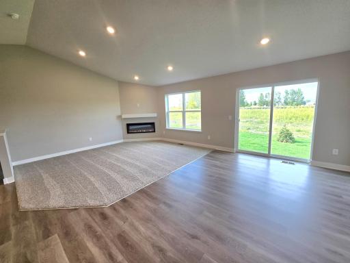 The Finnegan Main Floor Living Room at Highlands at Eagle View in Elko New Market. Photo is of actual home. Options and colors may vary. Ask Sales Agent for details.