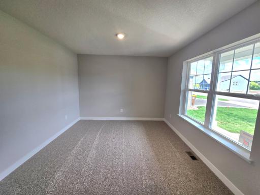 The Finnegan Flex Room at Highlands at Eagle View in Elko New Market. Photo is of actual home. Options and colors may vary. Ask Sales Agent for details.