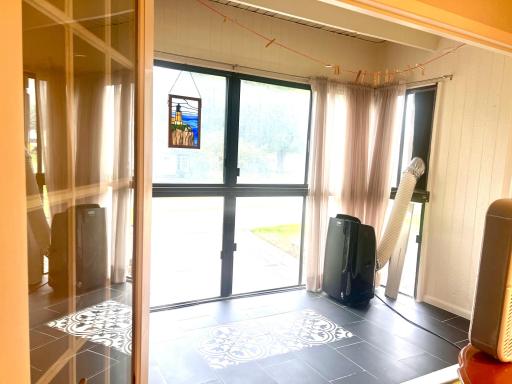 3 Season Porch with beautiful wide doors.jpeg