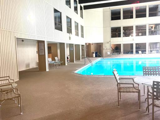 A beautiful sun-filled, well-lit pool, sauna, and hot tub.