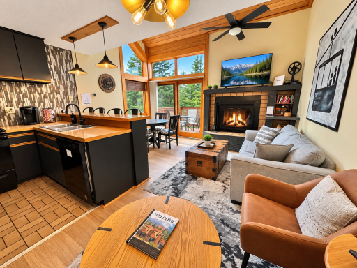 Cozy living room with wood burning fireplace.png