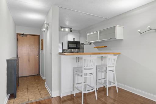 Dining area with breakfast bar seating
