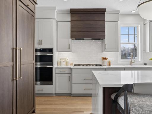 Built in oven/microwave combo & 36" gas range make everyday cooking feel extraordinary