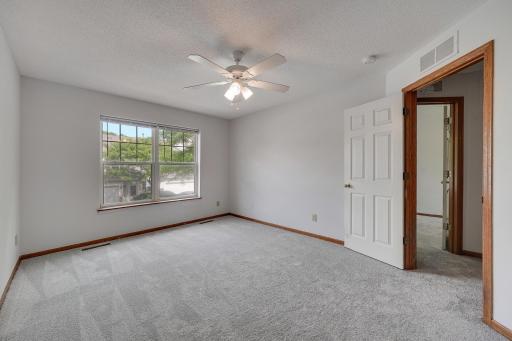 The primary suite includes a walk-in closet and a full ensuite bathroom. Laundry is a breeze with an upper level laundry room.